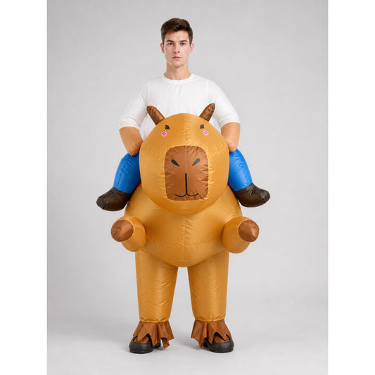 Adult wearing the inflatable riding capybara costume, front view, appearing to ride an orange-brown capybara