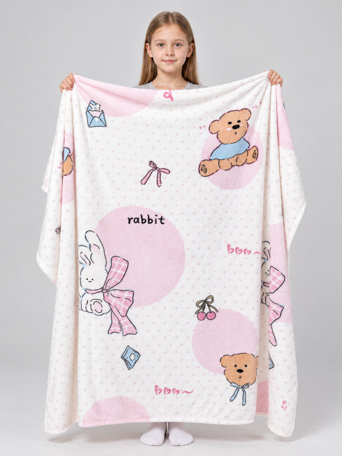Reversible blanket with cartoon print and bows