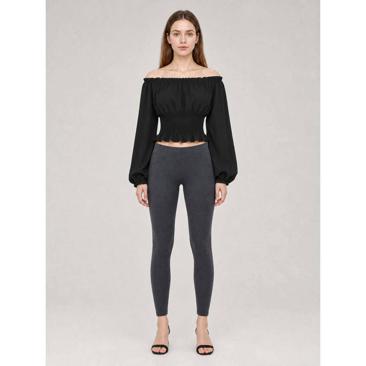 Black off-the-shoulder blouse with ruffles on-model view