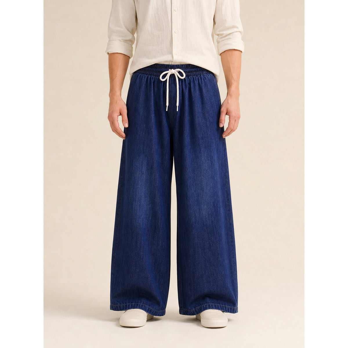 Wide-leg dark navy pants with drawstring on-model front view