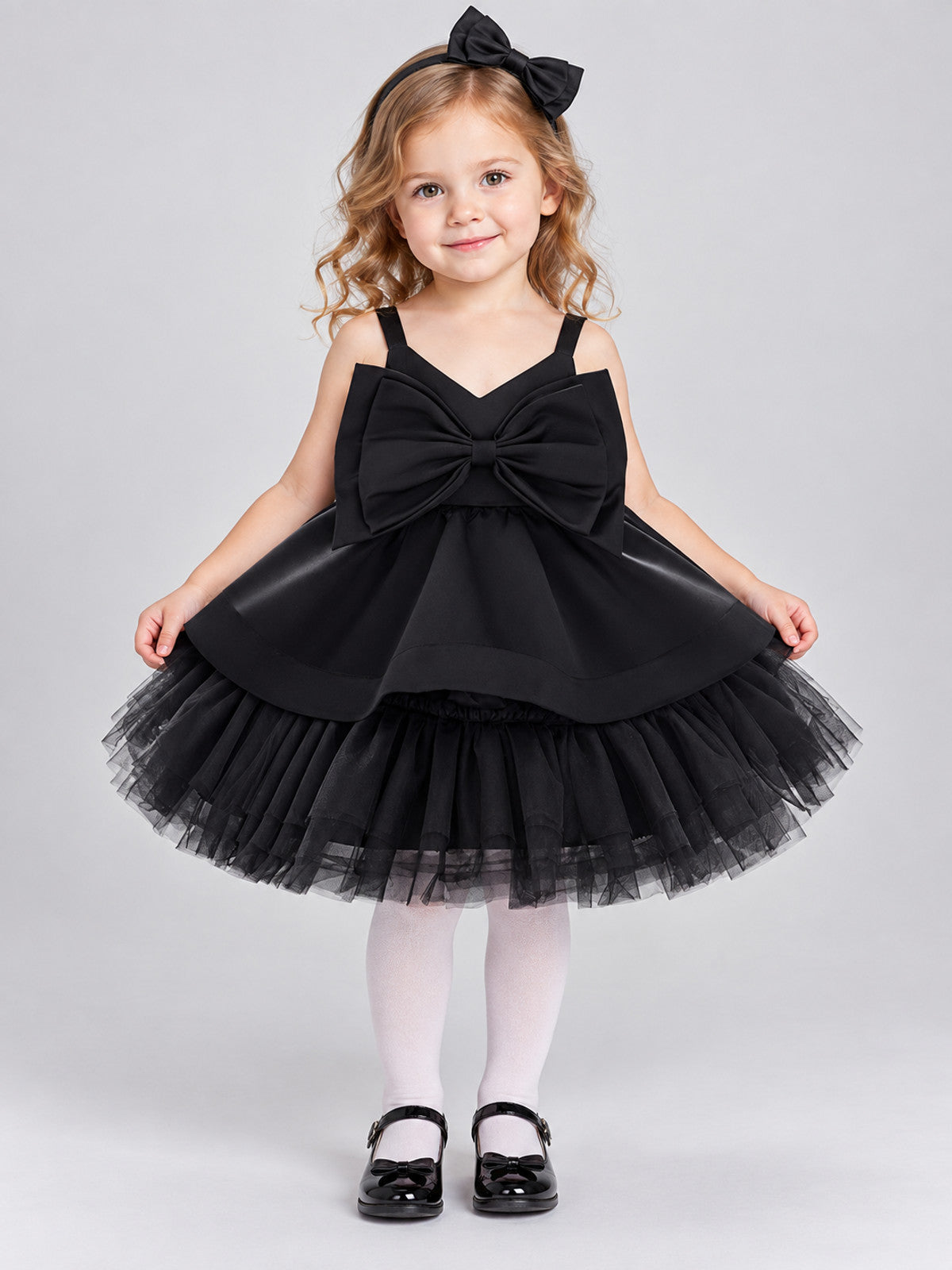 Black dress with bow and layered tulle skirt