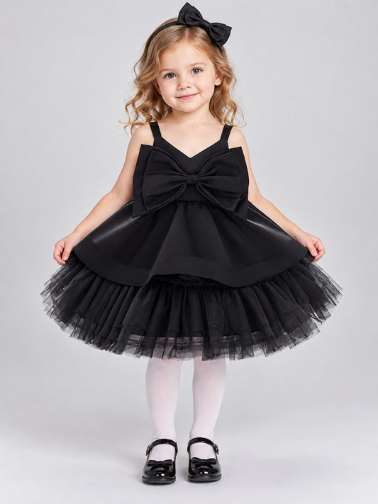 Black dress with bow and layered tulle skirt