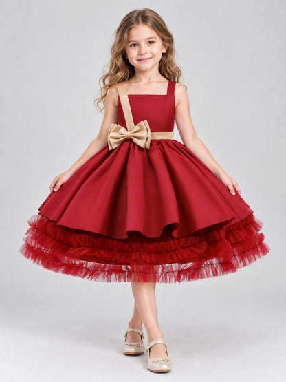 Burgundy sleeveless dress with gold bow and full skirt