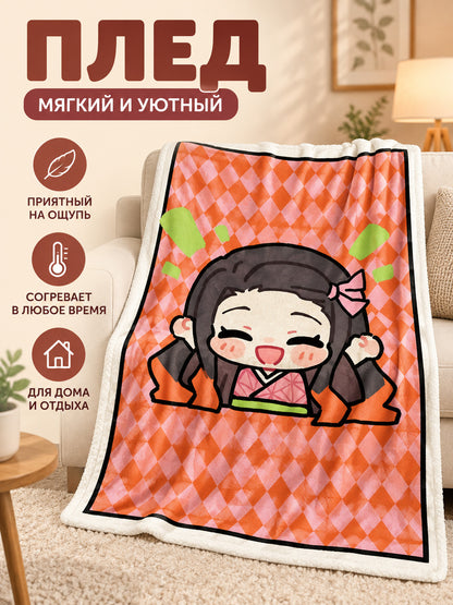 Orange and pink flannel blanket with cartoon print
