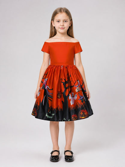 Orange children's dress with a Halloween print on-model view