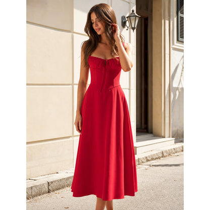 Red dress with thin straps and a fitted silhouette