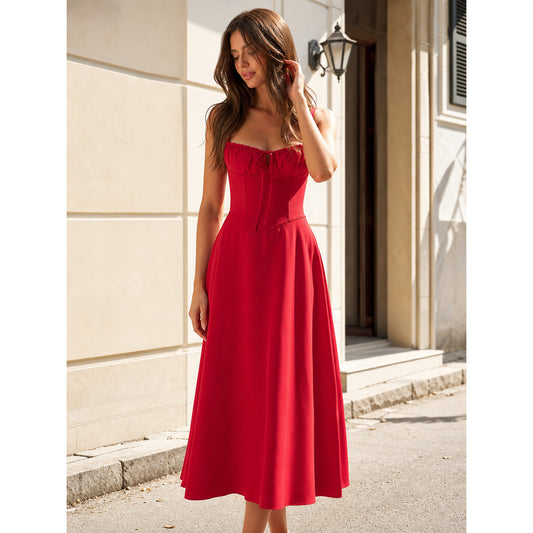Red dress with thin straps and a fitted silhouette