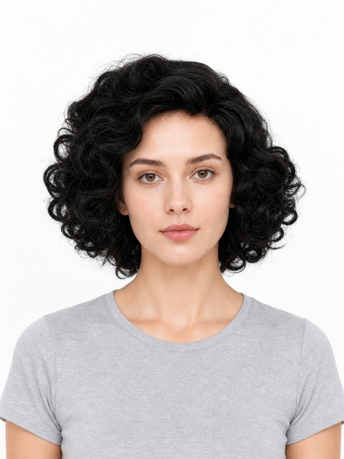 Black short curly wig with voluminous waves, shown front-facing on a model against a white background