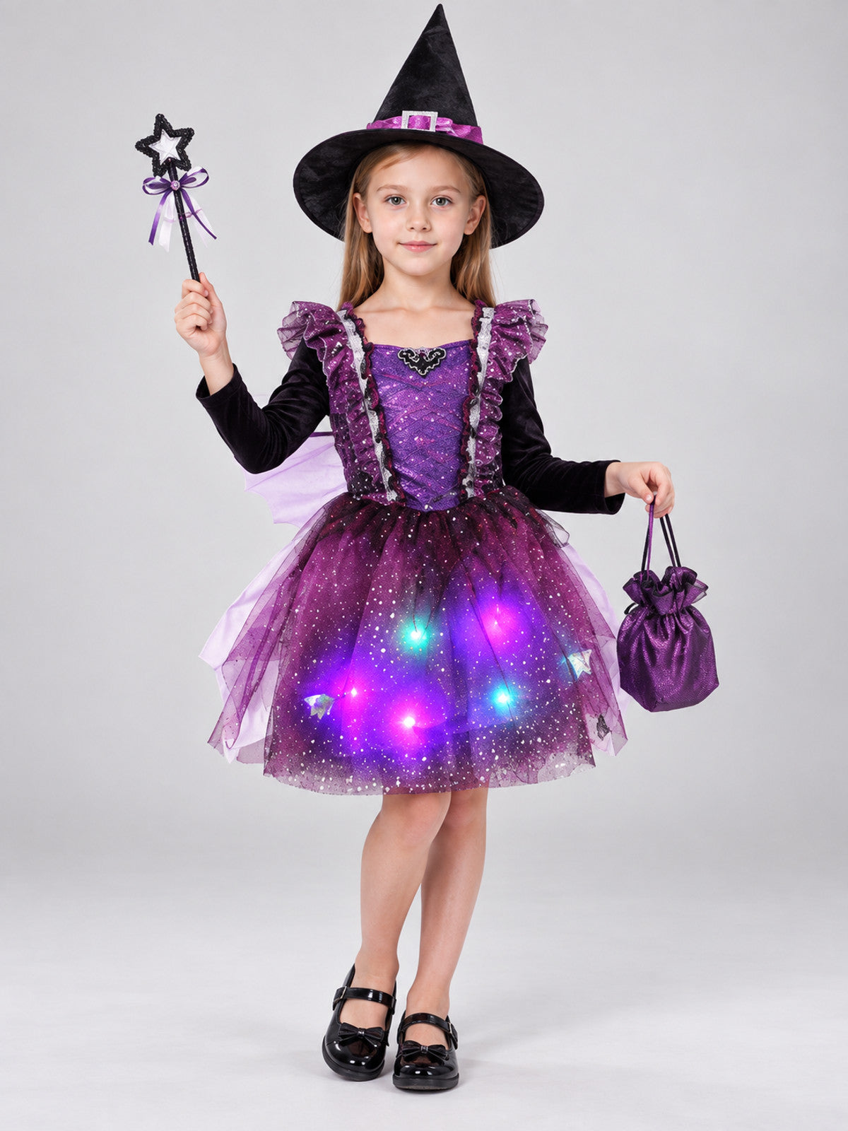 Kids' witch carnival costume with a glowing skirt