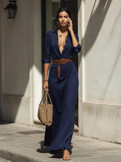 Women's dark navy dress with a belt and long sleeves
