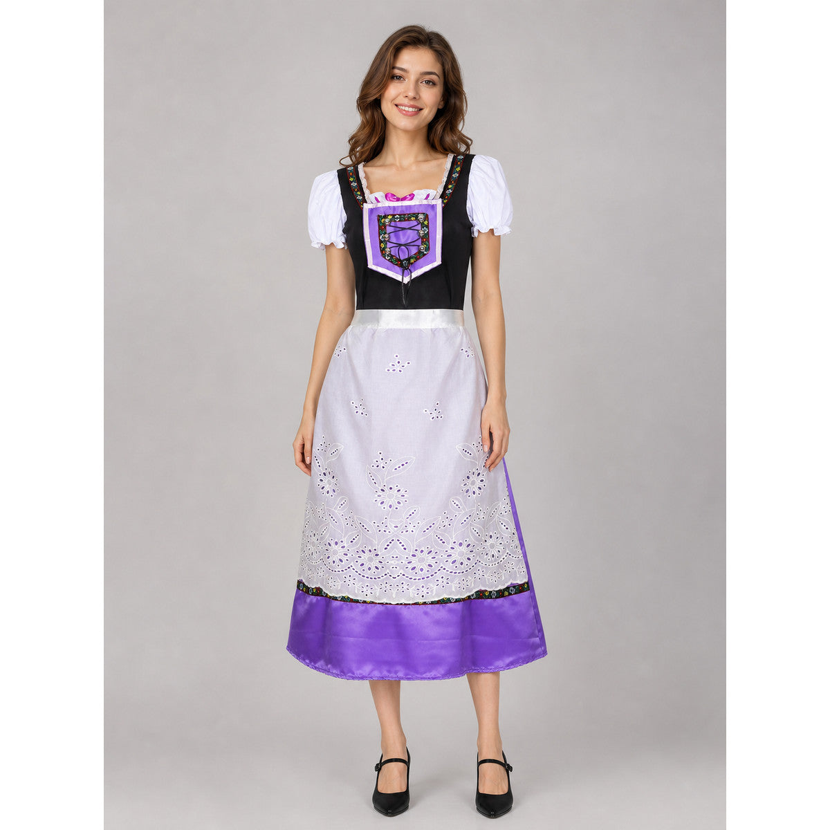 The dress is designed in an ethnic style and features a contrasting combination of white, pink, purple, and black. It has a black bodice, voluminous white puff sleeves, and a white waistband. The front is decorated with a purple lace-up det