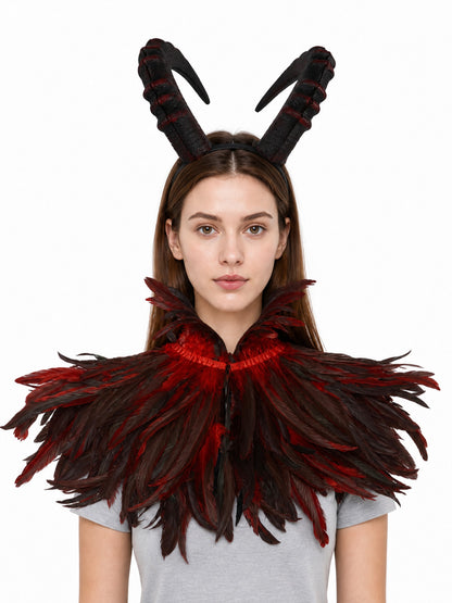 Horned headpiece with black and red textured horns, shown on a model with a matching feathered collar against a white background