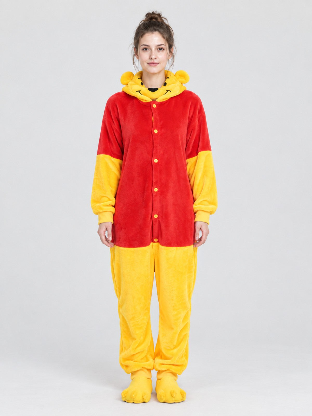 Red and yellow pajama jumpsuit with bear ears