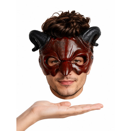 Horned carnival mask in glossy dark red with black curled horns, shown on a male model above an outstretched hand