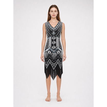 Sleeveless dress with a V-neckline and fitted silhouette, made from fabric featuring prominent bead and sequin embroidery. The decoration combines dense geometric patterns, chevron-shaped elements, and floral motifs, creating a striking loo