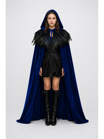 Blue hooded cape with a velvet-like finish and black feather trim, shown full-body on a model with front ties