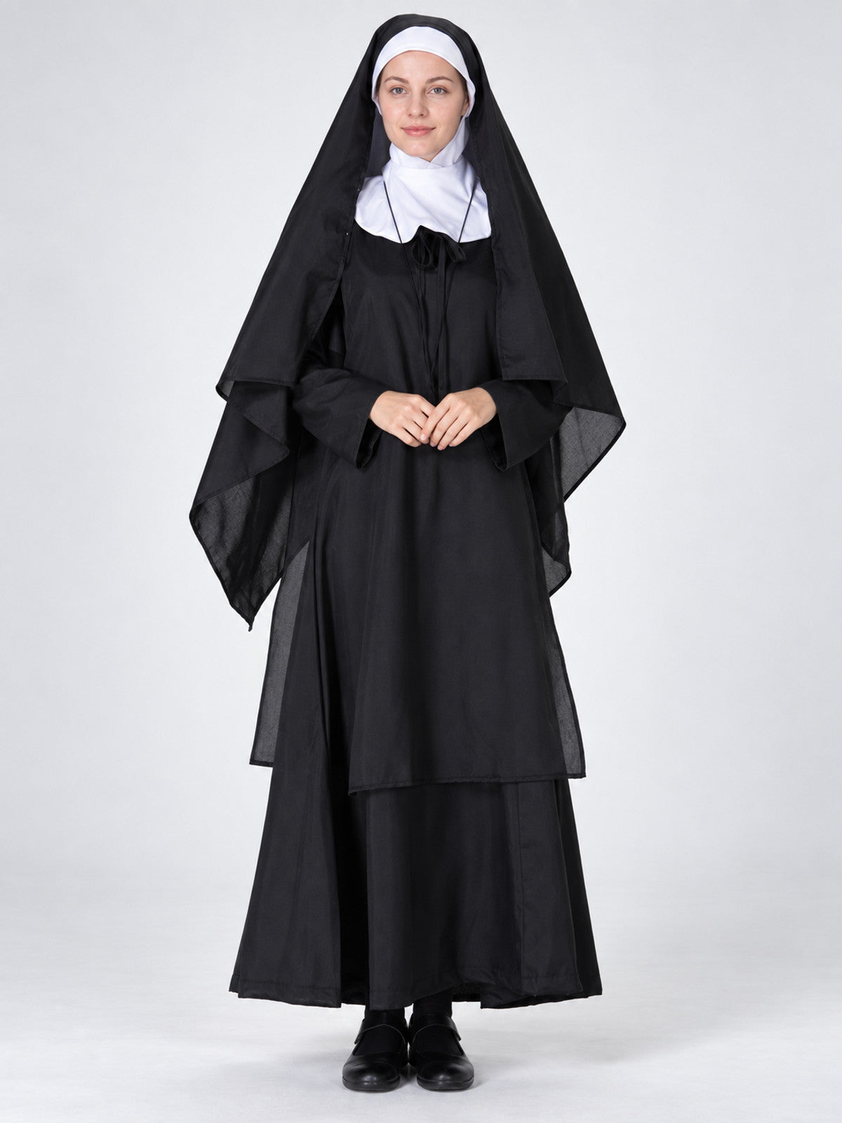Long black and white costume with headpiece and veil