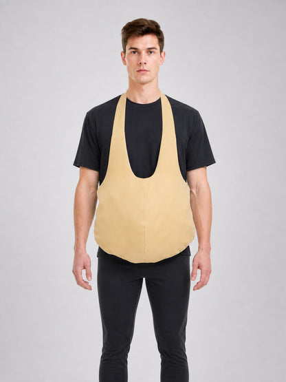 The fake belly is designed as a costume accessory with a large, rounded shape.