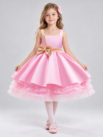 Pink girls' party dress with bow and puffy skirt