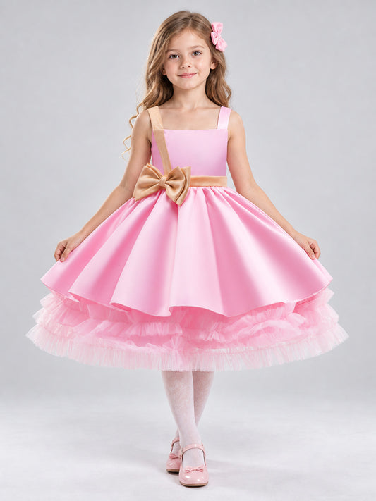 Pink girls' party dress with bow and puffy skirt