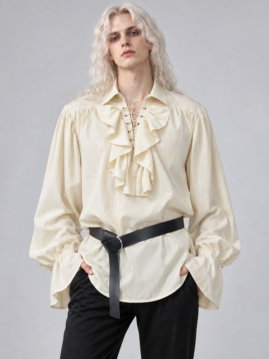 Model wearing a beige ruffled lace-up shirt with long flared cuffs, front view