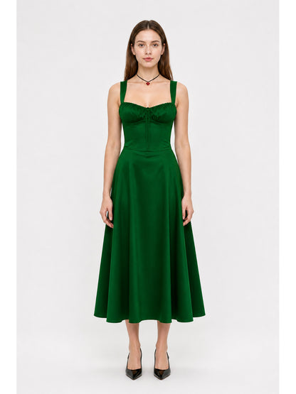 Green dress with thin straps and a square neckline