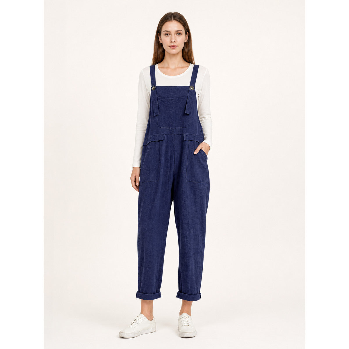 Loose-fit dark navy bib overalls with straps and pockets