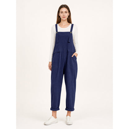 Loose-fit dark navy bib overalls with straps and pockets