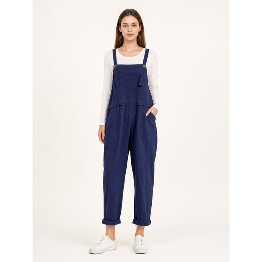 Loose-fit dark navy bib overalls with straps and pockets