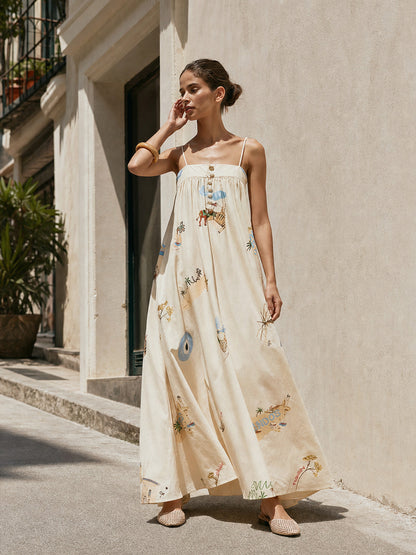 Long dress with thin straps, a print, and buttons