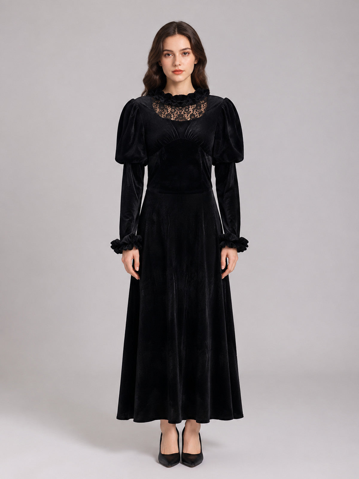 Long black corduroy dress with puff sleeves on-model view