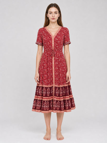 Midi dress with a floral print and tiered skirt front view