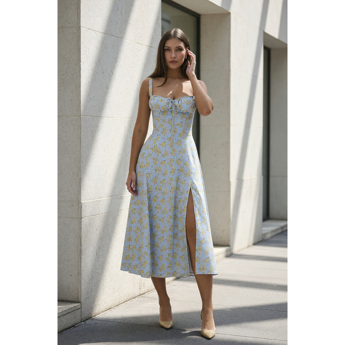 Women's midi dress with thin straps and a slit