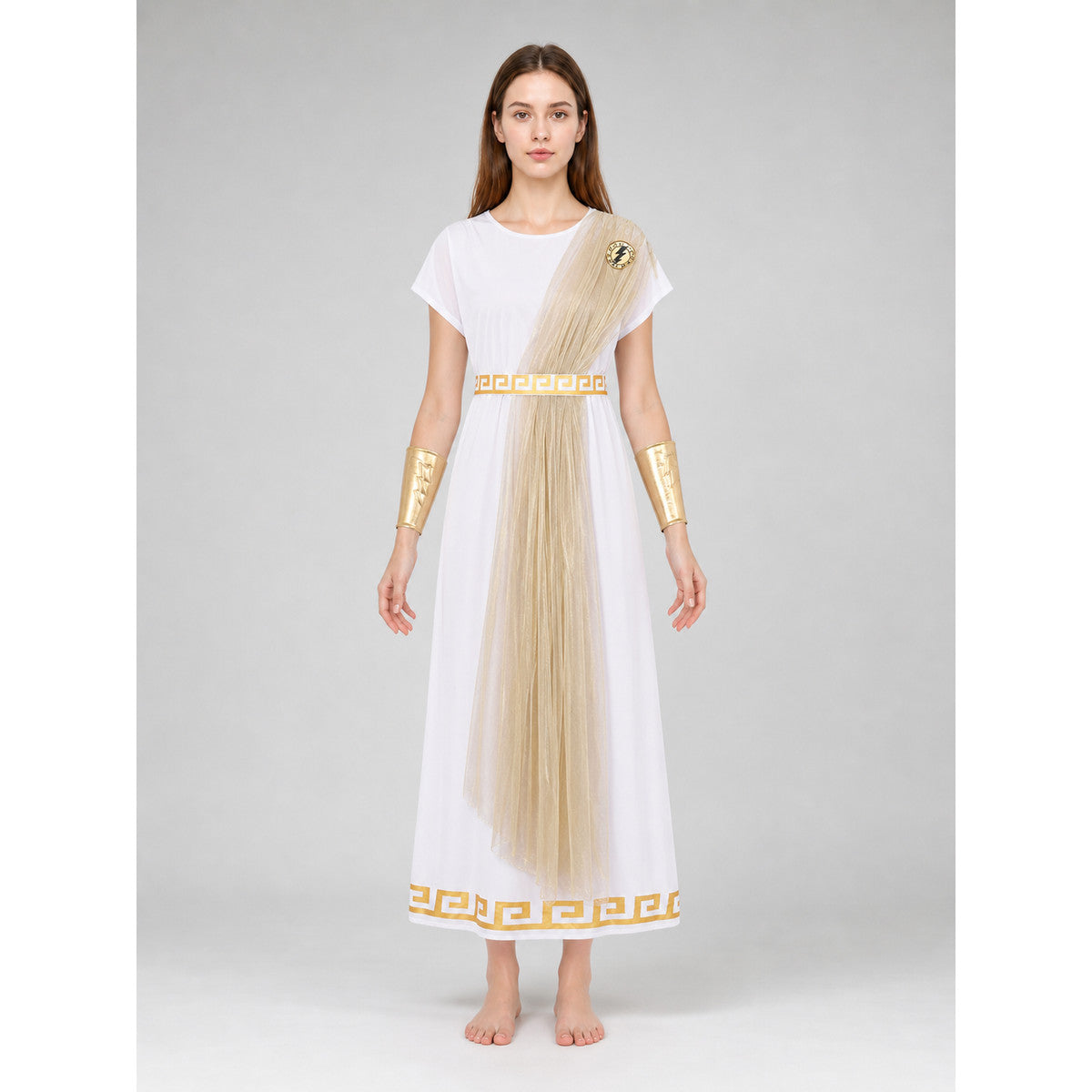 The Greek-style costume is designed as a classic draped garment with decorative details. The set includes a white tunic with sleeves, a belt or decorative sash with gold-tone trim, a long semi-transparent drape in a champagne shade, a pair 