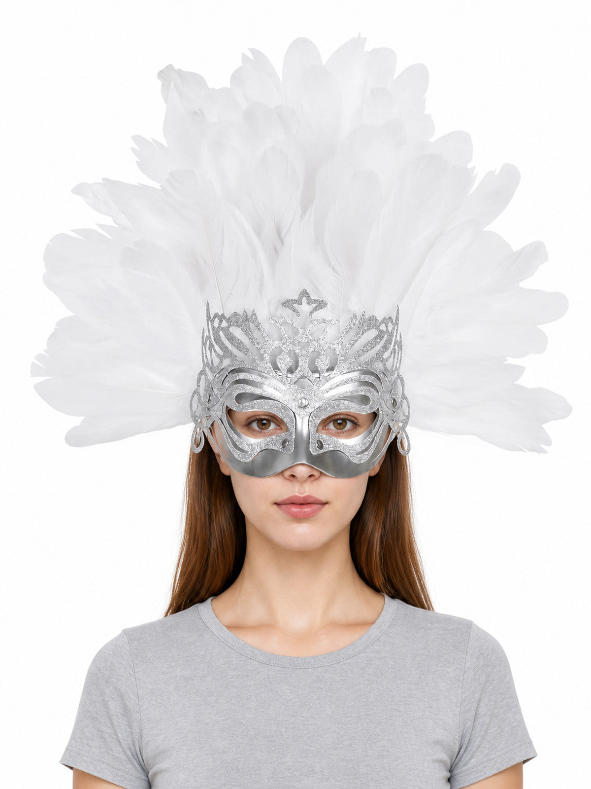Silver eye mask with white feathers, ornate cutout details, and dangling side loops worn by a woman