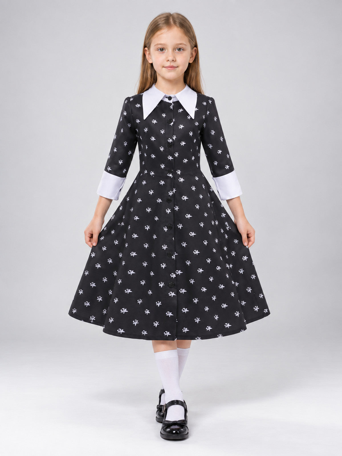 Children's costume dress with a white bow print on-model view