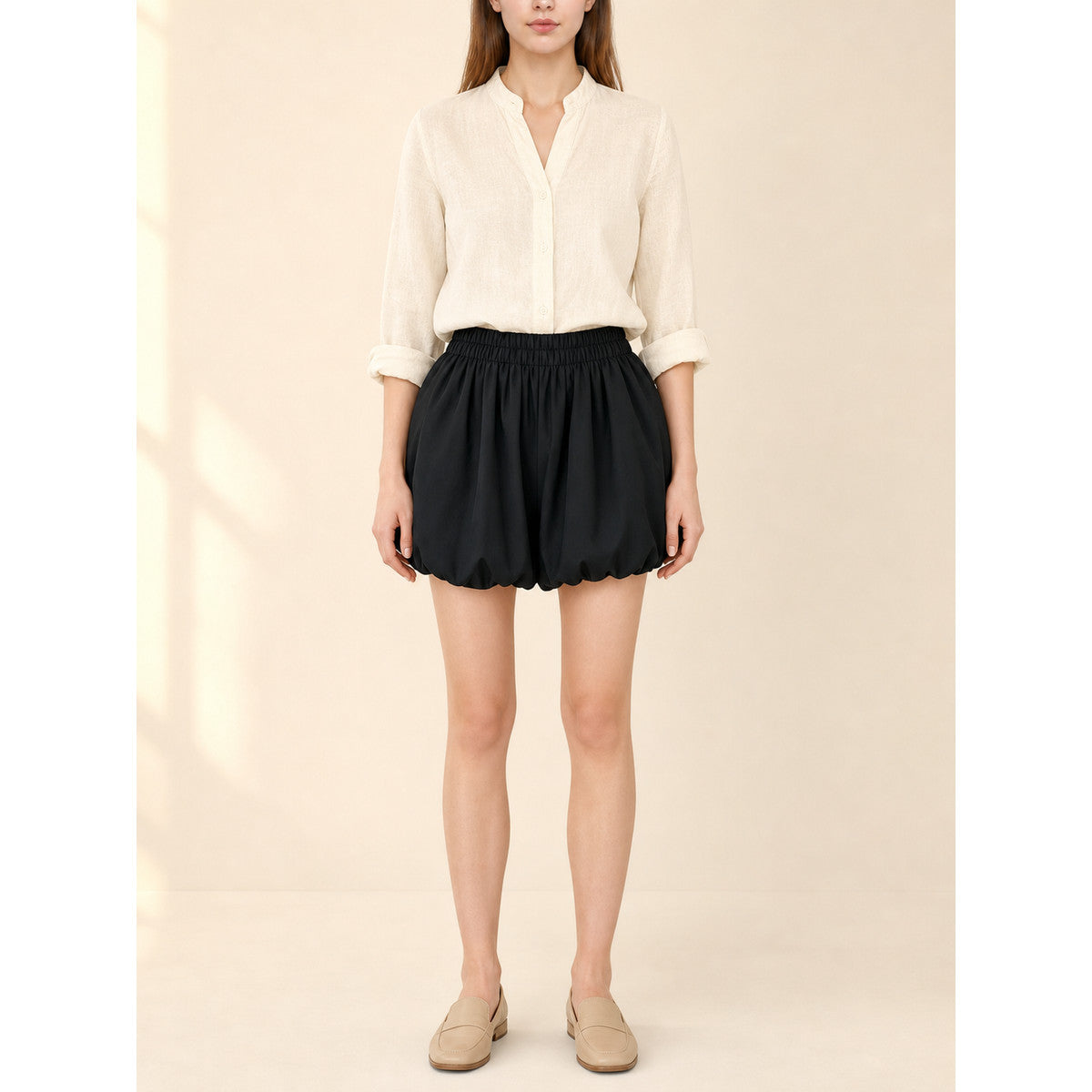 Mini skirt with a high elastic waistband and a full silhouette
