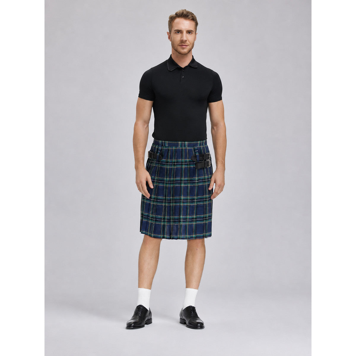 The plaid skirt is designed in a Scottish style and decorated with a crisscross pattern in blue and white, green, and black. Plaid runs across the entire surface of the garment, creating a distinctive, recognizable look. The skirt has a str