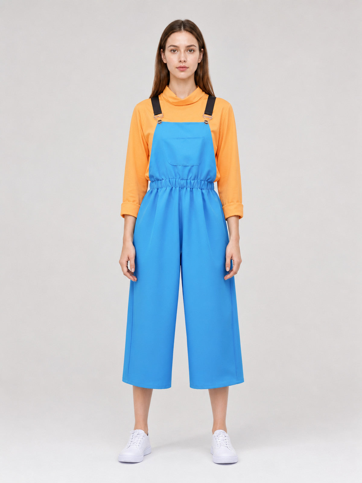 Cosplay jumpsuit with chest pocket and straps on-model view
