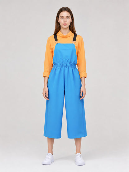 Cosplay jumpsuit with chest pocket and straps on-model view
