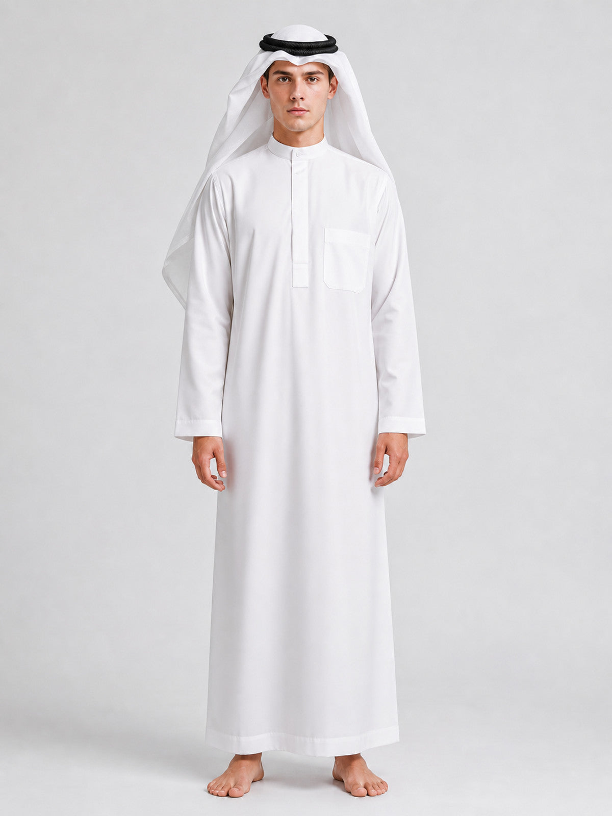 White long robe with smooth fabric, chest pocket and buttoned neckline, shown full-body on a model wearing a white head covering