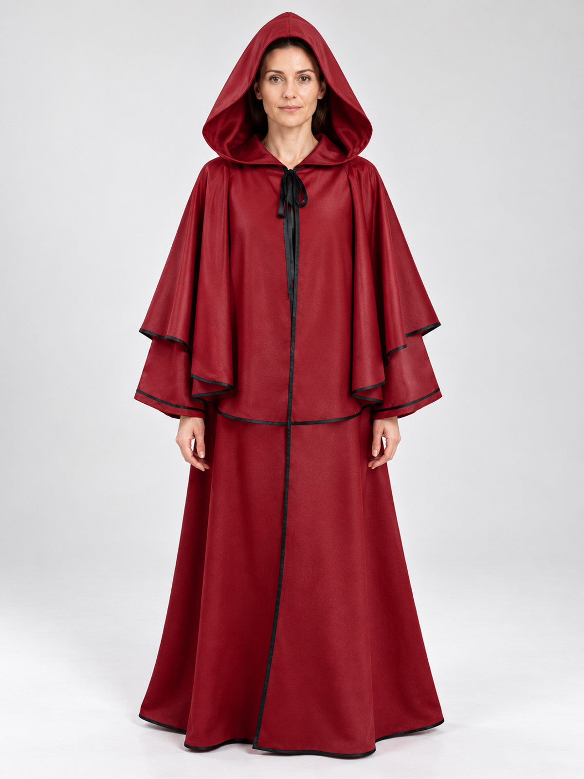 Long red hooded cloak with black trim