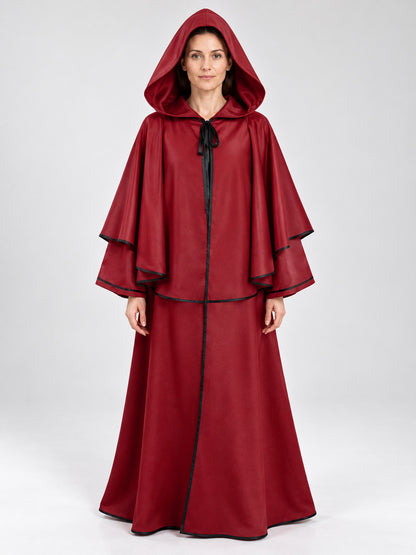 Long red hooded cloak with black trim