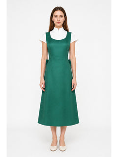 Long green pinafore dress with pockets
