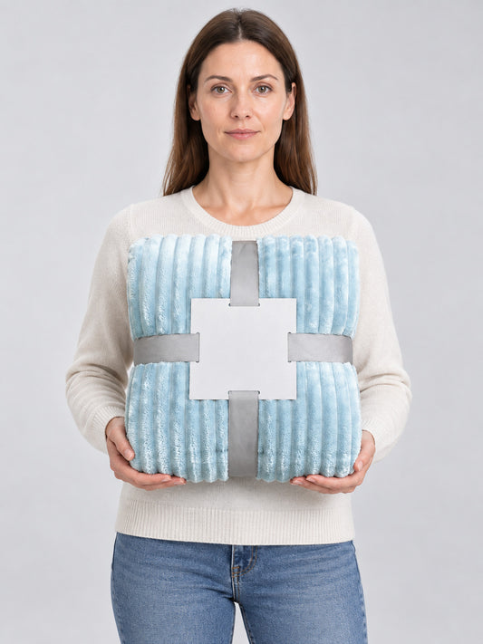 Light blue flannel throw blanket with a textured pattern