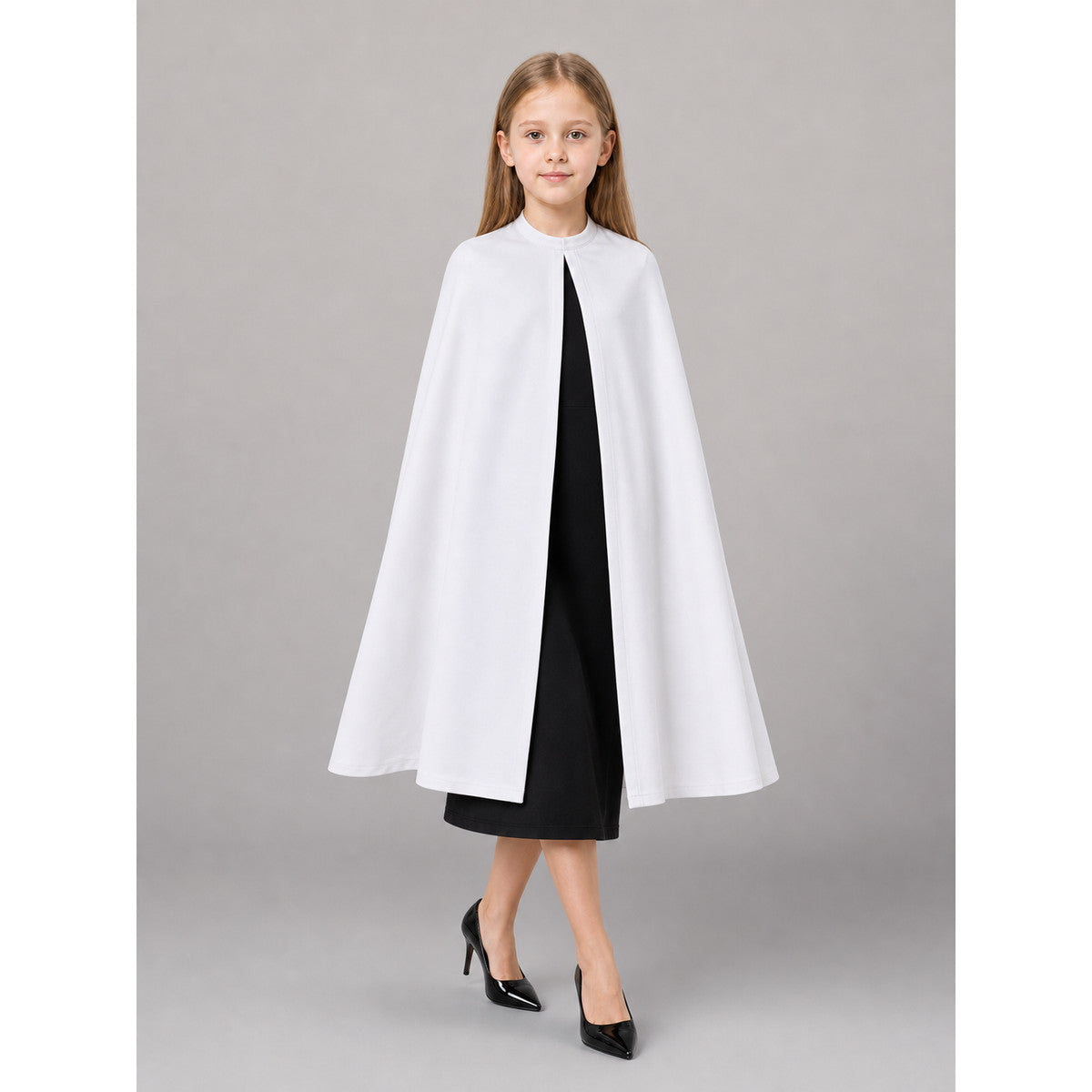 Description: White shoe covers—a pair of accessories for completing a costume and neatly covering shoes. The design consists of two identical overlays with a simple construction: the covers are worn over shoes, have open openings around the
