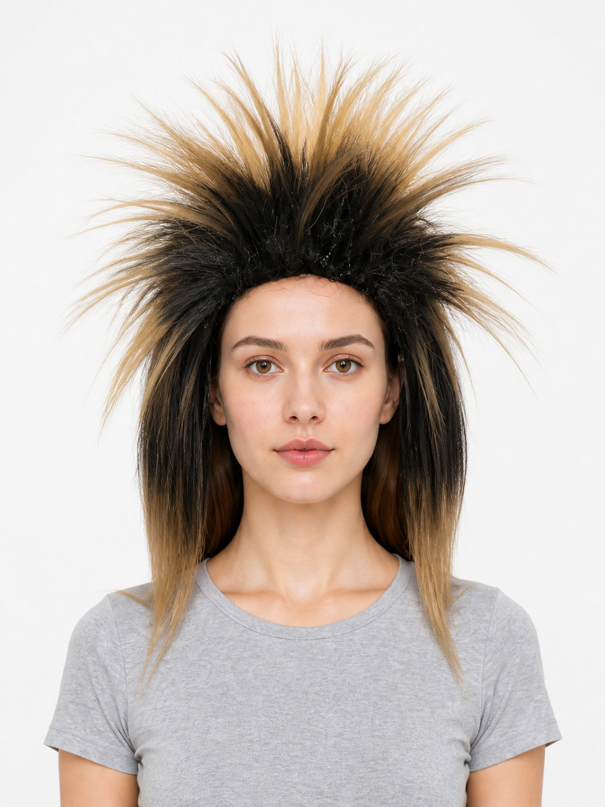 Costume wig with black and blonde straight fibers styled into tall spikes, shown in a close-up portrait on a model