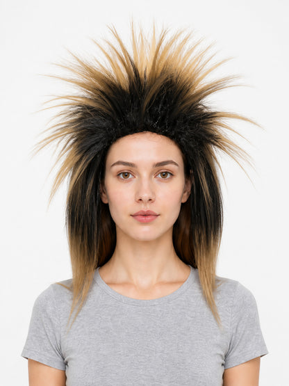 Costume wig with black and blonde straight fibers styled into tall spikes, shown in a close-up portrait on a model