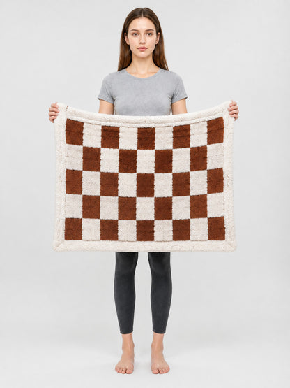 Double-Sided Dog Blanket in Brown-and-Cream Plaid on-model view