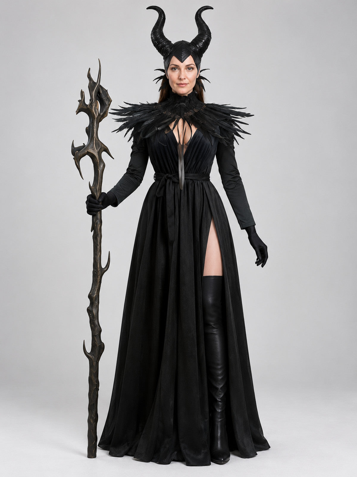 Witch costume: long black floor-length dress, feathers, horns